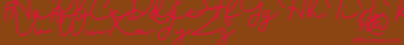 Blesson Font – Red Fonts on Brown Background