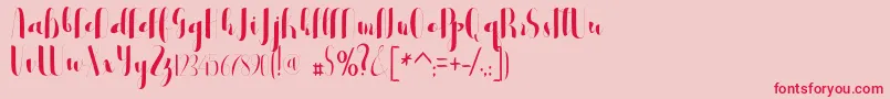 フォントblester – ピンクの背景に赤い文字