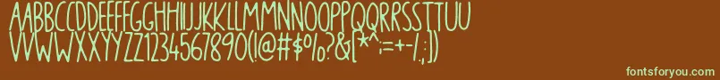blikfangDEMO-fontti – vihreät fontit ruskealla taustalla