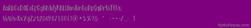 フォントBLINKIES – 紫の背景に灰色の文字