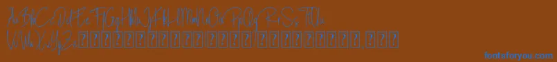 Blista Rade Font – Blue Fonts on Brown Background