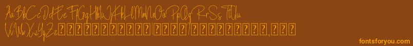 Blista Rade Font – Orange Fonts on Brown Background