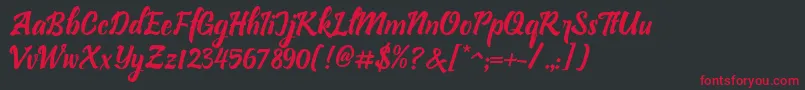 フォントBllastt Italic – 黒い背景に赤い文字