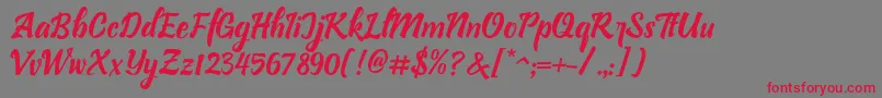 Bllastt Italic Font – Red Fonts on Gray Background