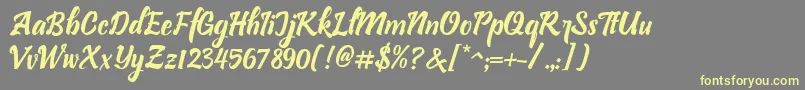 Fonte Bllastt Italic – fontes amarelas em um fundo cinza