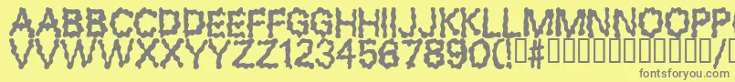Fonte BLOBS – fontes cinzas em um fundo amarelo