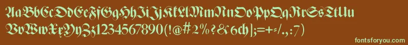 フォントZenfrax – 緑色の文字が茶色の背景にあります。