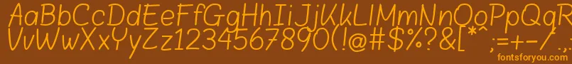 Blokletters Balpen Font – Orange Fonts on Brown Background