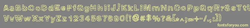 Blokqued Font – Yellow Fonts on Gray Background