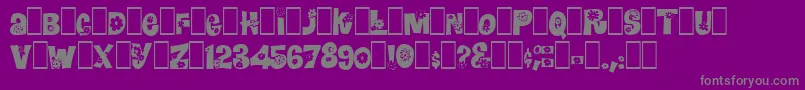 Blomster-fontti – harmaat kirjasimet violetilla taustalla