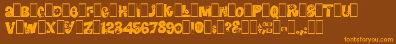 Blomster-fontti – oranssit fontit ruskealla taustalla
