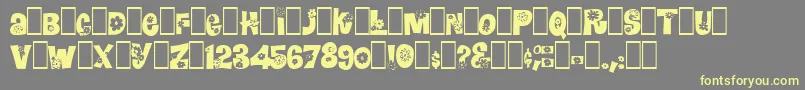 Blomster-fontti – keltaiset fontit harmaalla taustalla