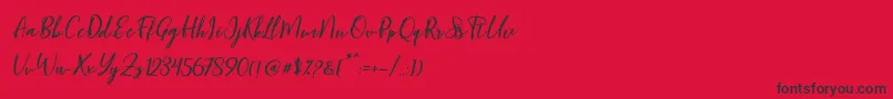 Blondy Slant Font – Black Fonts on Red Background