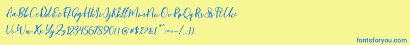 Blondy Slant Font – Blue Fonts on Yellow Background