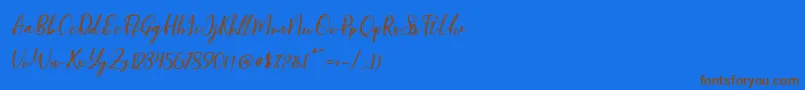 フォントBlondy Slant – 茶色の文字が青い背景にあります。