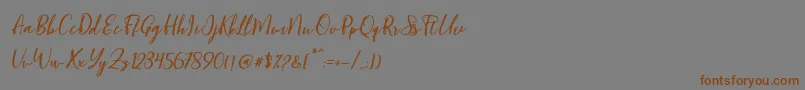 Blondy Slant Font – Brown Fonts on Gray Background