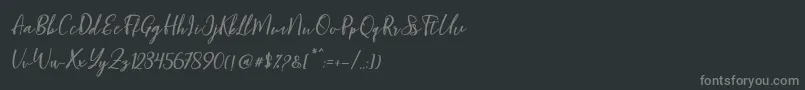 Blondy Slant Font – Gray Fonts on Black Background