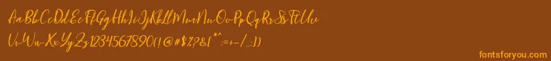 Blondy Slant Font – Orange Fonts on Brown Background