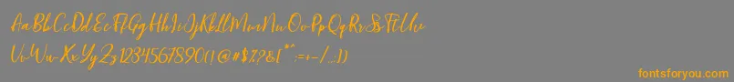 Blondy Slant Font – Orange Fonts on Gray Background