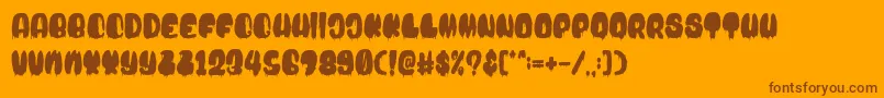Blood Bold Drip Font – Brown Fonts on Orange Background