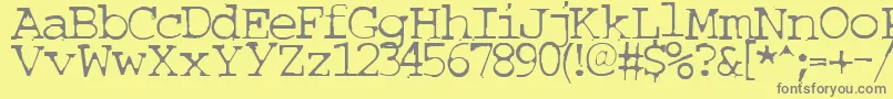 Couriertxt Font – Gray Fonts on Yellow Background