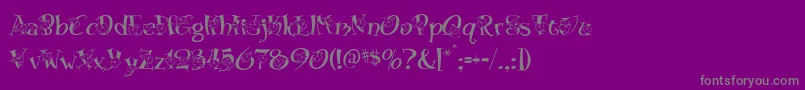 Blossom-Schriftart – Graue Schriften auf violettem Hintergrund