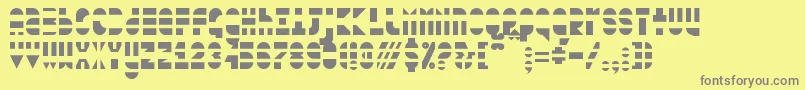 blown out-fontti – harmaat kirjasimet keltaisella taustalla