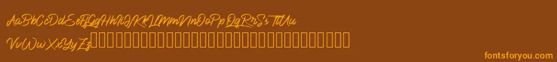 BlueKing Font – Orange Fonts on Brown Background