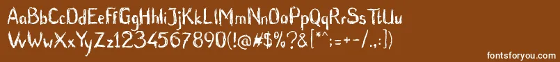 BluntBrush-Schriftart – Weiße Schriften auf braunem Hintergrund