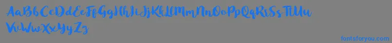 Czcionka Blusty Script Free – niebieskie czcionki na szarym tle