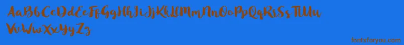 En savoir plus sur la police Blusty Script Free Police Blusty Script Free – polices brunes sur fond bleu
