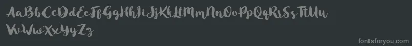 Шрифт Blusty Script Free – серые шрифты на чёрном фоне