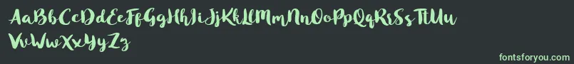 Czcionka Blusty Script Free – zielone czcionki na czarnym tle