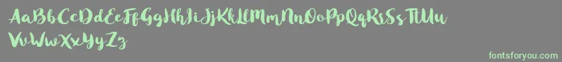 Blusty Script Free-fontti – vihreät fontit harmaalla taustalla
