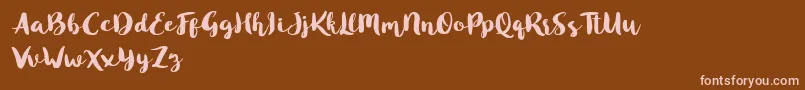 Czcionka Blusty Script Free – różowe czcionki na brązowym tle