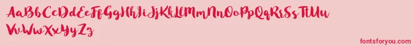 fuente Blusty Script Free – Fuentes Rojas Sobre Fondo Rosa