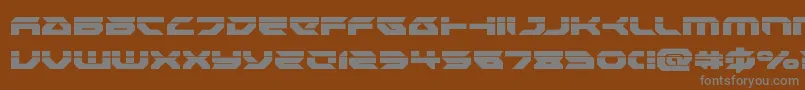 Royalsamurailaser-fontti – harmaat kirjasimet ruskealla taustalla