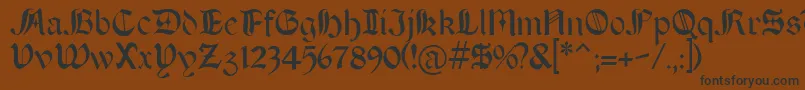 フォントBOERT    – 黒い文字が茶色の背景にあります