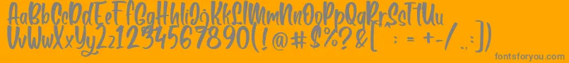 Boga bogi regular-Schriftart – Graue Schriften auf orangefarbenem Hintergrund
