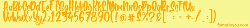 Fonte Boga bogi regular – fontes laranjas em um fundo amarelo