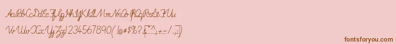 フォントImransSchoolB – ピンクの背景に茶色のフォント