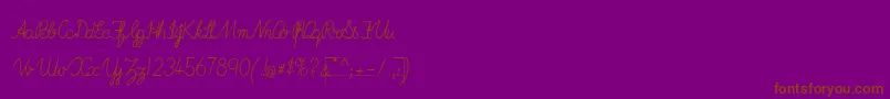 Fonte ImransSchoolB – fontes marrons em um fundo roxo