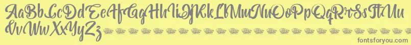 Weitere Informationen zur Bohemian Melody-Schriftart Bohemian Melody-Schriftart – Graue Schriften auf gelbem Hintergrund