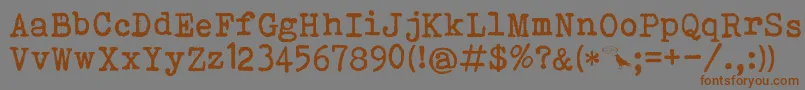 Bohemian Typewriter Font – Brown Fonts on Gray Background