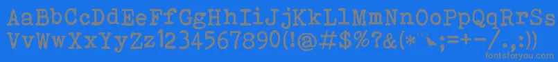Bohemian Typewriter Font – Gray Fonts on Blue Background