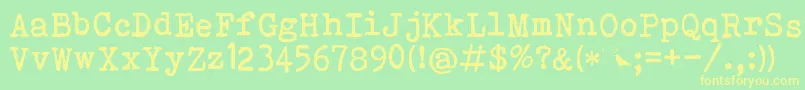 Bohemian Typewriter Font – Yellow Fonts on Green Background