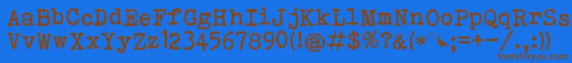Czcionka Bohemian Typewriter – brązowe czcionki na niebieskim tle