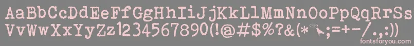 Bohemian Typewriter Font – Pink Fonts on Gray Background