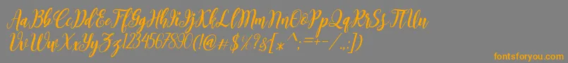 フォントBointang Cifoy – オレンジの文字は灰色の背景にあります。