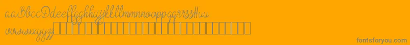 フォントBokretan Demo – オレンジの背景に灰色の文字